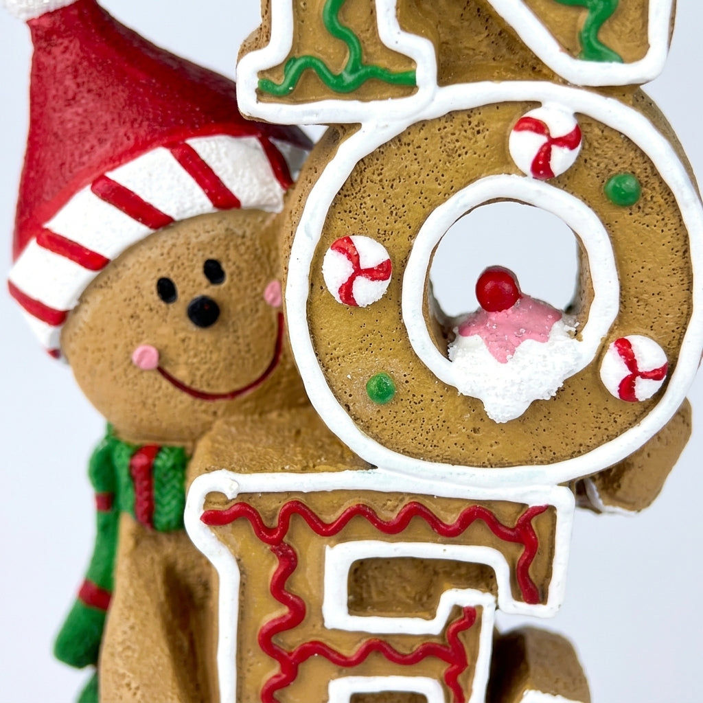 NOEL Sign - Close-up details of Christmas gingerbread NOEL standing sign O cookie and peering character